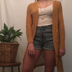 yellow cardigan
